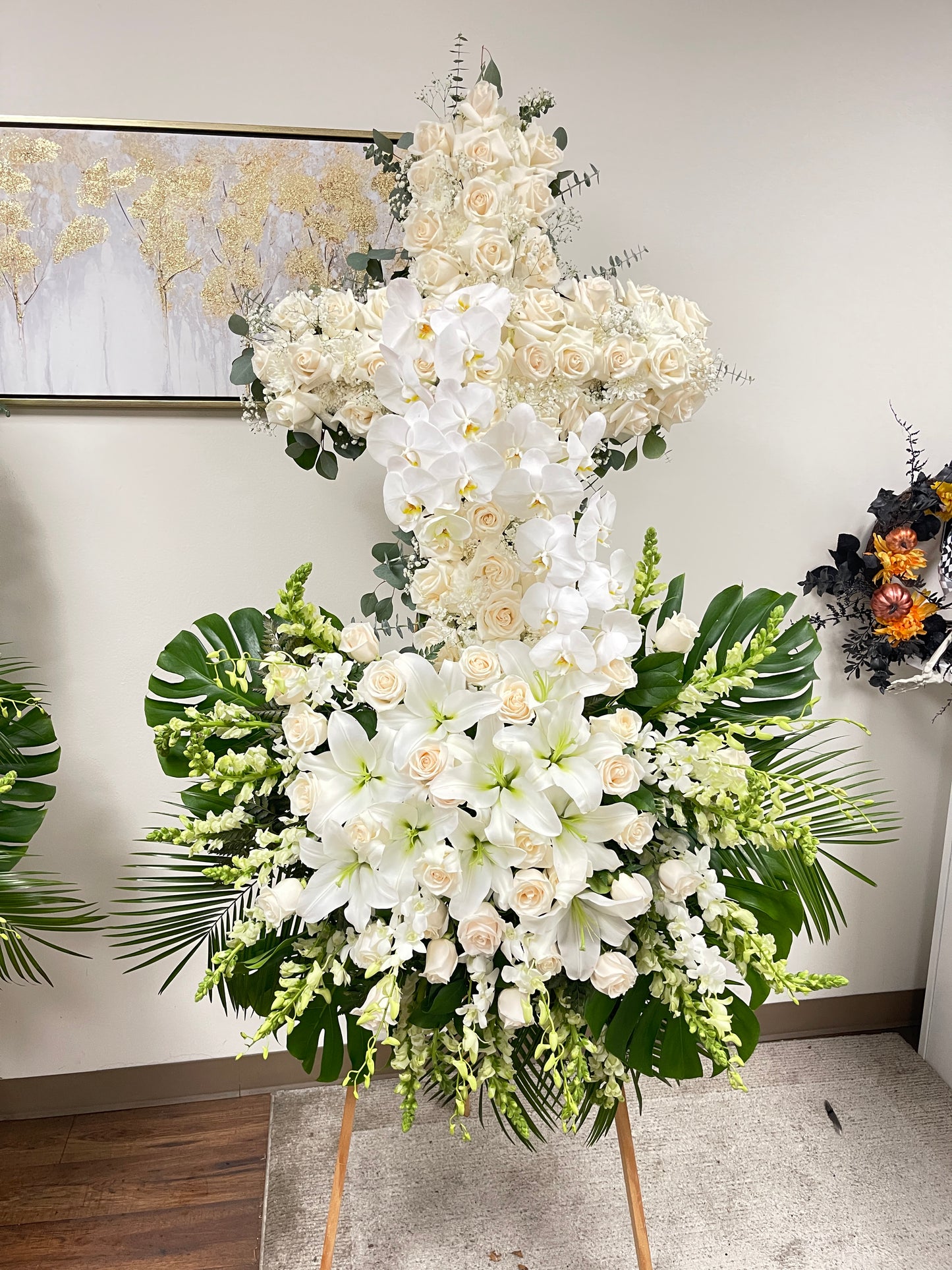 Rose and orchid Cross standing spray