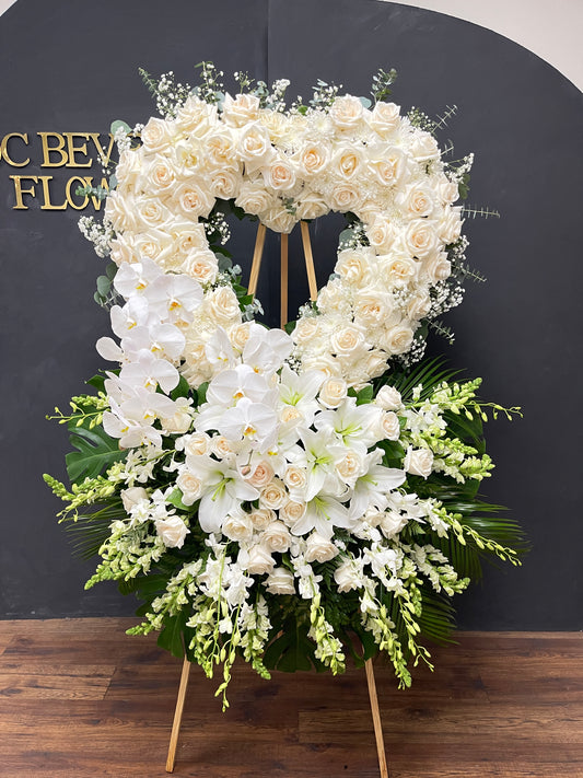 Rose and orchid Heart standing spray