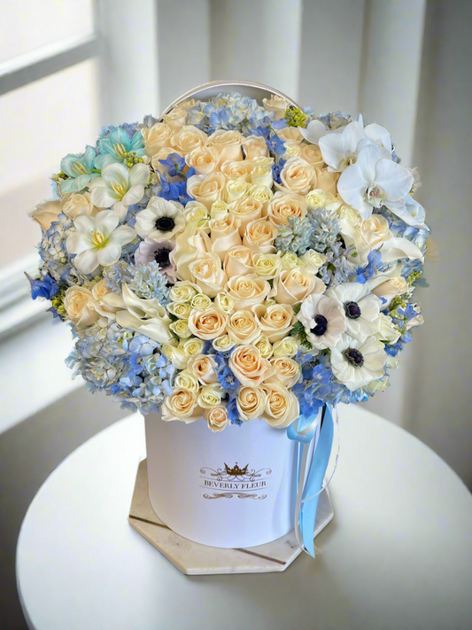 Grand de Fleurs - Baby in Blue Box